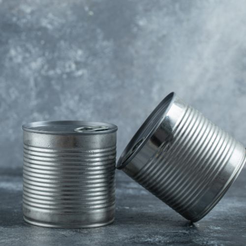 two-tin-cans-placed-marble (1)